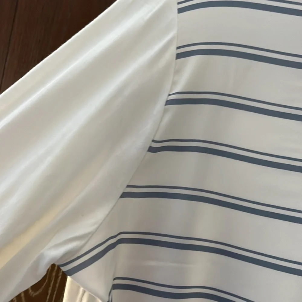 Ann Taylor long sleeved blouse. White with blue stripes and metal buttons. Sm